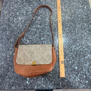 Madewell leather crossbody bag featuring a genuine calf hair flap with a neutral